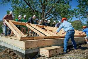 The wall raising of a house in the Lykins neighborhood of Kansas City