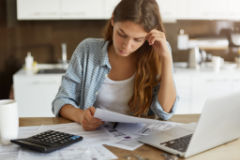 woman contemplating bankruptcy and taxes